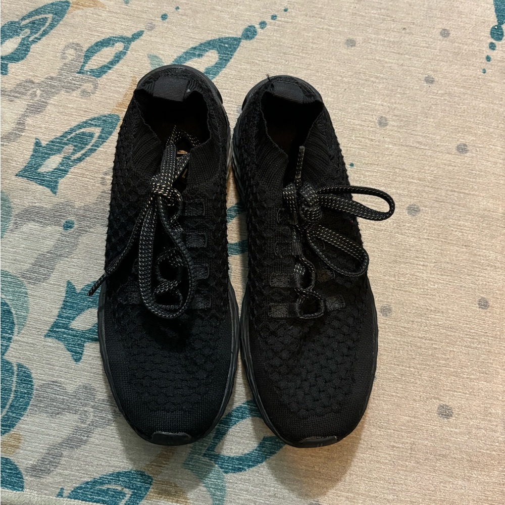 Black NOBULL running shoes